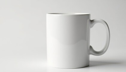 Obraz premium Classic white mug, handle visible, clean background, hot beverage, ceramic, white background