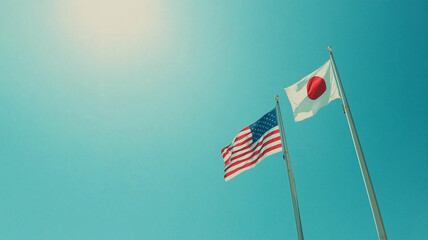 青空に並ぶ日本とアメリカの国旗