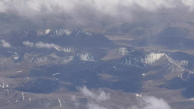 Aerial shot of Qilian mountains covered with snow in Gansu province, China.