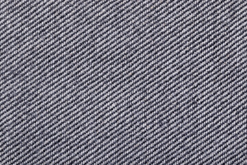 Texture of gray rough grunge cotton inside out denim fabric close up, textured textile background