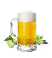 Fresh beer in glass mug and hop flowers on white background