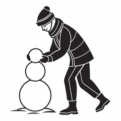 Child building snowman winter fun snow day