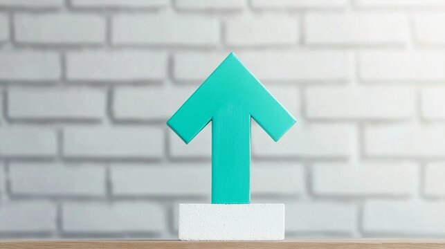 an upward rising green arrow on a wooden desk, symbolizing business growth and success