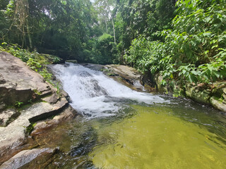 Cascading Cascade: A serene visual narrative unfolds of a cascade, where water gracefully descends...