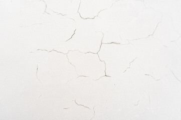 Textura de pared blanca agrietada con fisuras naturales para diseño gráfico