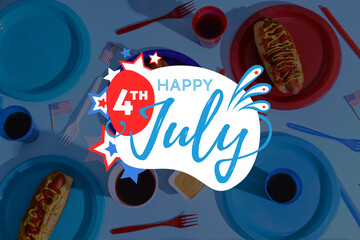 Tasty hot dogs with USA flags, cola and plastic plates on blue background. American Independence...