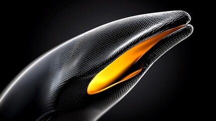 Obraz premium Close-up of a sleek, futuristic black and orange object resembling a creature's head against a dark backdrop