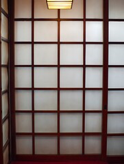 Traditional Japanese Shoji Screen Divider with Warm Lighting. A detailed close up image of a beautiful, intricately designed room divider.