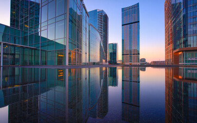 New York City skyline at dusk with skyscrapers and urban streets
