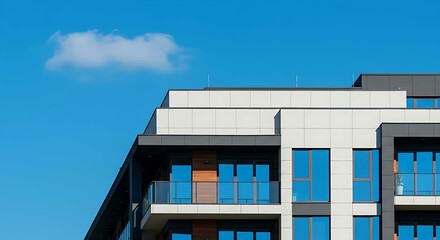 Obraz premium Modern Apartment Building Exterior – Contemporary Residential Architecture with Blue Sky Background. Luxury Urban Housing and Real Estate Concept. Copy Space Included.