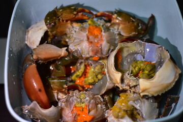 yellow curry with serrated mud crab, Fresh serrated mud crabs prepare to sell on street food market, Giant Mud Crabs, Serrated mud crab, Mangrove crab, Black crab,nighttime