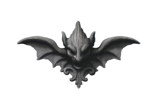 Stone gargoyle sculpture with bat wings and ornate details, cut out