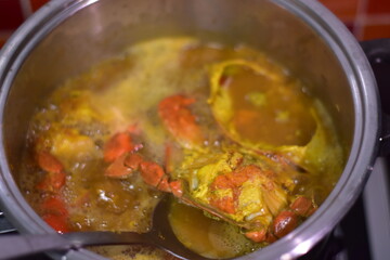 yellow curry with serrated mud crab, Fresh serrated mud crabs prepare to sell on street food market, Giant Mud Crabs, Serrated mud crab, Mangrove crab, Black crab,nighttime