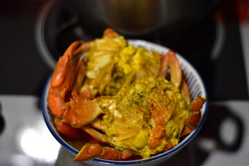 yellow curry with serrated mud crab, Fresh serrated mud crabs prepare to sell on street food market, Giant Mud Crabs, Serrated mud crab, Mangrove crab, Black crab,nighttime