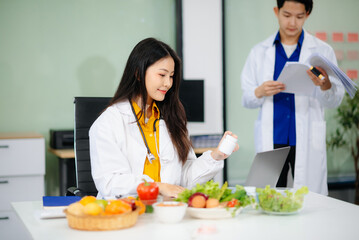 Doctors sharing fresh vegetables, promoting health and nutrition. Ideal for wellness, healthcare, and science themes.