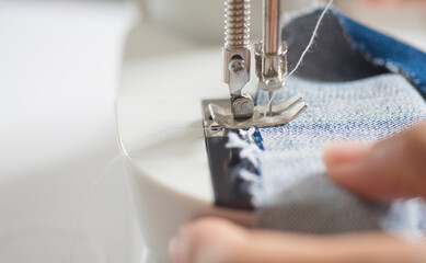 sewing machine with a needle