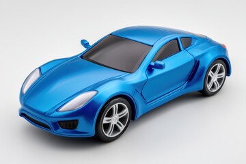 Obraz premium A shiny blue toy car with detailed wheels on a plain white surface in a studio shot
