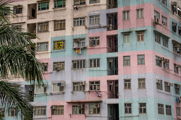 Colorful rainbow pastel building and facade windows background in public park