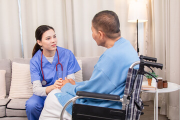 Obraz premium Senior woman in wheelchair discussing health with nurse on sofa, both smiling and sharing emotional connection, illustrating trust and support in home care setting, healthcare, illness, patient.