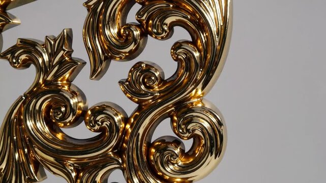 Elegant golden scrollwork ornament shifting perspectives in high definition art sequence
