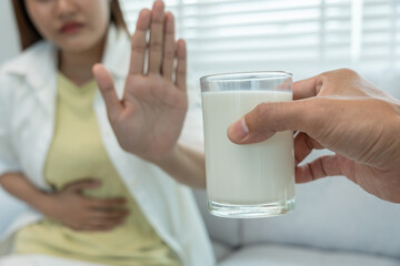 Milk allergens, woman confused milk, runny stuffy sore nose suffer from intolerance allergy trigger...