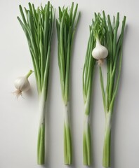 Close-up of vibrant green onion bulbs and stems against white backdrop , white, vitamins