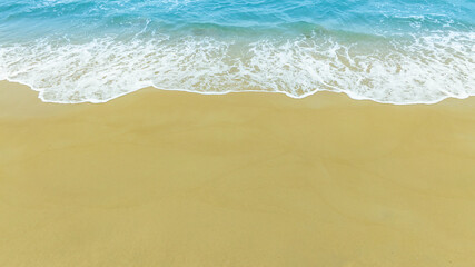 Nature of the beach and sea Summer with sunshine, sandy beaches, clear blue waters sparkling against the blue sky. On an island with good ecology and environment Background for summer vacation	