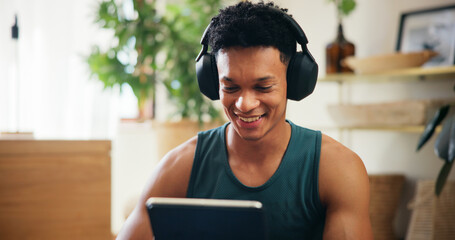Home, man and tablet with music for fitness, virtual exercise and application for audio track....