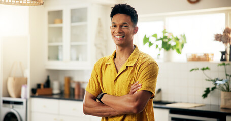 Arms crossed, kitchen and portrait of happy man in home with chef skills and practice for cooking....