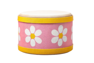 Colorful drum with daisy design on pink background and yellow trim, cut out