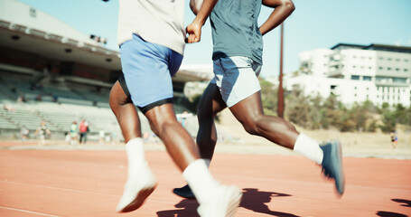 Naklejka premium Legs, people and running for race on track for exercise, training and competition for marathon. Active, men and runner with speed for fitness event, performance and sports challenge for tournament