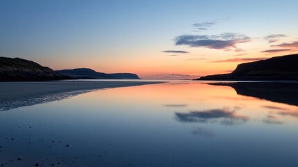 Fototapeta premium Tranquil coastal sunrise reflecting in still water