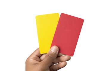 Hand holding yellow and red cards isolated on black background, cut out