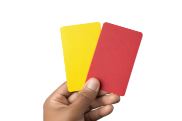 Hand holding yellow and red cards isolated on black background, cut out