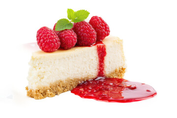 Raspberry cheesecake slice with fresh berries and mint garnish on crumbly base, cut out