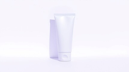 Blank white tube, likely cosmetic or skincare product,  on a plain, light purple background.  Soft shadows