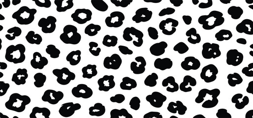Fototapeta premium Seamless black and white leopard print pattern vector background. Abstract animal skin fur texture with irregular spots. Ideal for fashion, textiles, backgrounds, wallpapers, and digital designs.