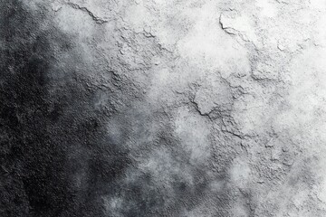 Close-up of a textured black and white abstract surface with rough, cracked patterns and gradient shading creating a moody atmosphere