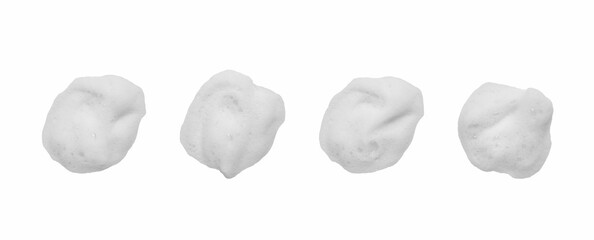 Isolated on a white background, a heap of foamy, soapy suds, created by shampoo and body wash, forms a thick, fluffy texture in the shape of bubbles, their abstract pattern and transparent surface	