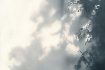 soft light filtering through delicate leaves casting gentle shadows on a light background conveying calm and tranquility