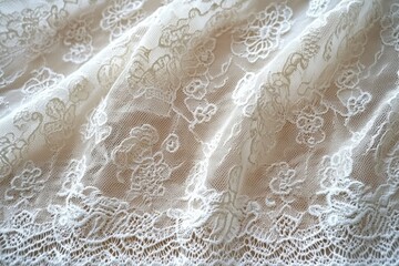 close-up view of delicate white lace fabric with floral patterns softly draped showing fine intricate details and textures