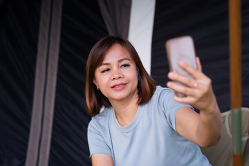Close up of young woman using smartphone