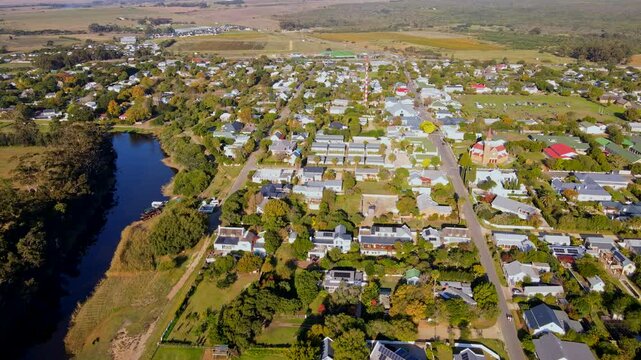 High sunset aerial view over countryside town Stanford located next to river
