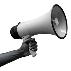 Black and white photograph of a human hand holding a large megaphone