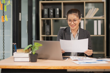Fototapeta premium Businesswoman calling customer consultant employee in office in the morning, finance manager talking on phone and solving problem with smartphone in corporate communication.