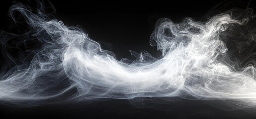 Naklejka premium Swirling white smoke or mist flowing and twisting gracefully against a black background creating an ethereal and mysterious atmosphere