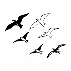A versatile vector set of flying bird silhouettes, including seagulls and doves, perfect for illustrating freedom and wildlife in nature