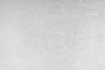 Modern stucco texture in light gray color creating an abstract background for design projects and interior decoration concept for walls and backdrop