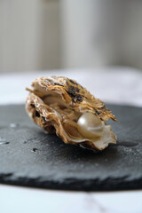 Oyster with the pearl of Isoliroano staged photography