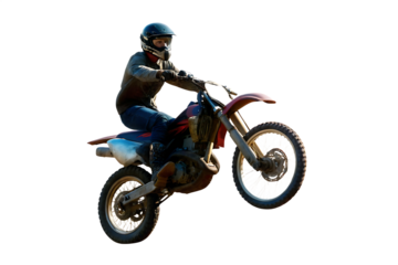Motocross rider in mid-air jump isolated on a white background
